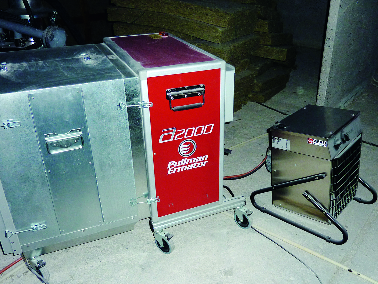 an heater and air cleaner used in a PCB bake-out.